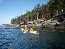 Kayakers take advantage of nice weather to paddle around in puget sound. Photo: DNR.